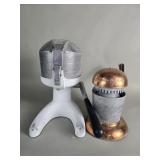 A pair of vintage juicers. A Juice king and a