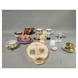 Group of porcelain and ceramic teacups, saucers,
