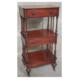 Antique mahogany tiered stand on casters