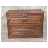 Antique carved walnut chest of drawers
