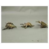 Three brass tone spelter prehistoric animal