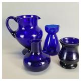 Group of cobalt glass vases and pitcher