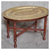 Morrocan-style brass tray top table