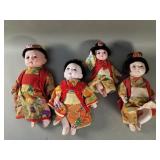 Group of vintage porcelain asian dolls