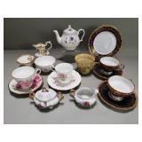 Group of vintage porcelain and ceramic teacups,