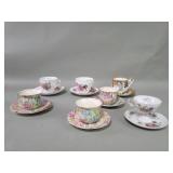 Group of porcelain cups and saucers.