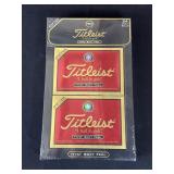 Factory sealed Titleist golf balls