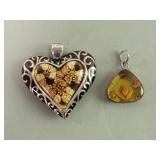 Sterling silver flowers in amber pendants