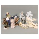 Group of porcelain and ceramic figurines including
