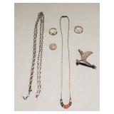 Silver pieces, rings, necklaces, bird brooch
