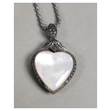 Sterling silver, marcasite, mother of pearl, and