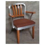 The Shaw Walker Co. aluminum and maple arm chair