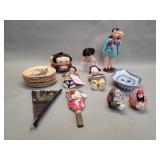Group of vintage Asian dolls, plates, hand fans,