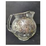 Vintage glass pitcher with silver overlay
