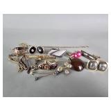 Vintage cufflinks, tie clips, tie bars, and a