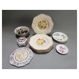 Group of porcelain plates, saucers, and bowl,