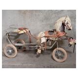 Vintage metal and leather pedal horse tricycle