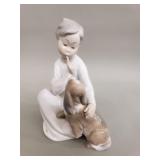 Lladro "Boy with dog" porcelain figurine