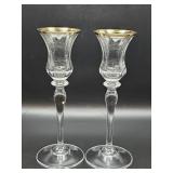 Pair of gold-rimmed crystal candlesticks