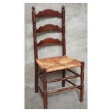Vintage walnut ladder back side chair with rush