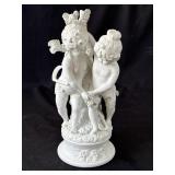Vintage porcelain cherub sculpture