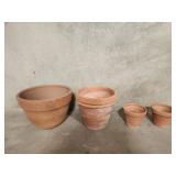 4 terracotta planters