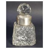 Crystal and sterling silver perfume bottle