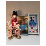 Group of vintage dolls and rabbit figurines