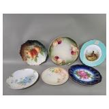 Group of porcelain hand painted plates