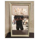 Wood-framed mirror with shell accents