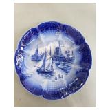 Antique blue and white ceramic "Delph" plate