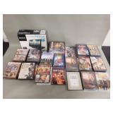 Sony portable 9" DVD player and assortment of DVDs