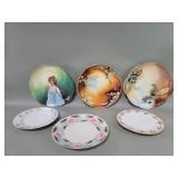Group of porcelain hand painted plates