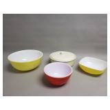 Three Pyrex mixing bowls and one Bauer pottery