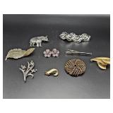 Vintage designer jewelry: brooches, bracelet,