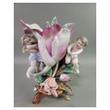 Antique K.P.M. porcelain cherub and flower