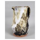 Signed studio art pottery drip glaze pitcher by
