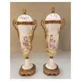 Pair of antique handpainted porcelain urns