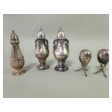 Five silver plate salt and pepper shakers