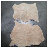 Pair of leather hide, bundled