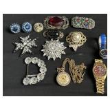 Group of brooches with watches