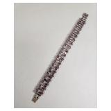 Sterling silver tennis bracelet with purple and
