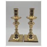 Pair of polished brass pillar-style candlesticks