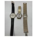 Group of three wristwatches