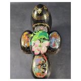 Group of porcelain decorations and music box eggs