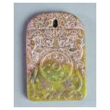 Carved jade amulet pendant depicting two flying