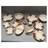 Group of Franciscan plates, bowls, sugar and