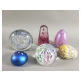 Six hand blown art glass paperweights some signed