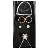 Group of wedding bands, earrings, necklaces and