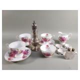Box of misc teacups, saucers, sugar shaker, etc